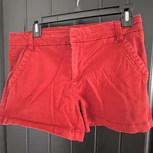 TINSEL brand shorts. Brick red in color. Size 28